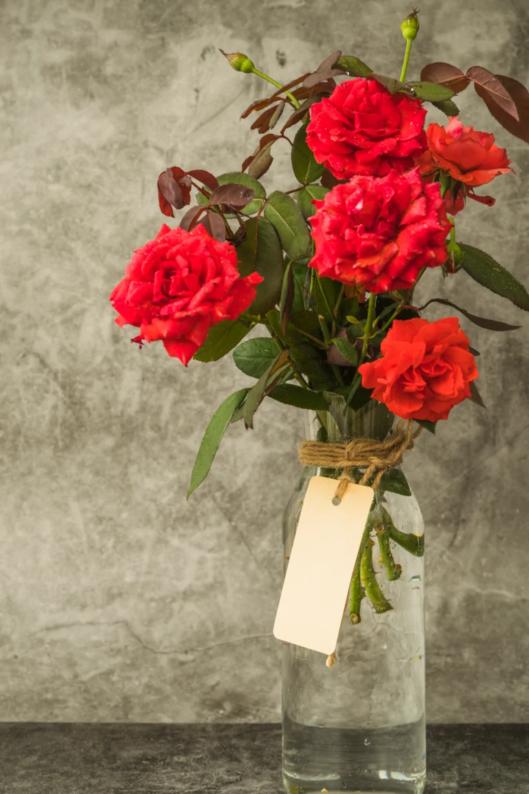 red-roses-bouquet-glass-bottle-with-blank-tag