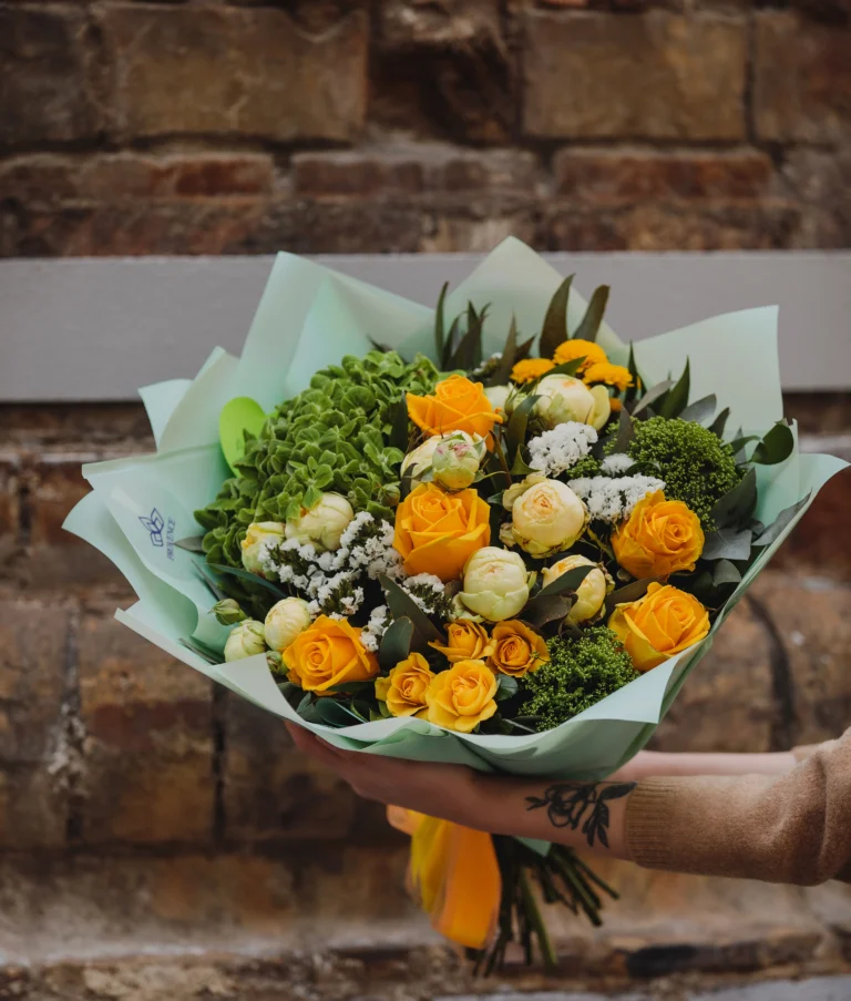 side-view-bouquet-yellow-color-roses-white-color-peonies-eustomas-trachelium-wall-flowers-brick-wall-wall